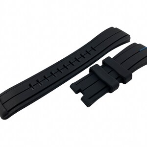 May include: Black rubber watch strap with a textured design and a blue stripe on the underside.