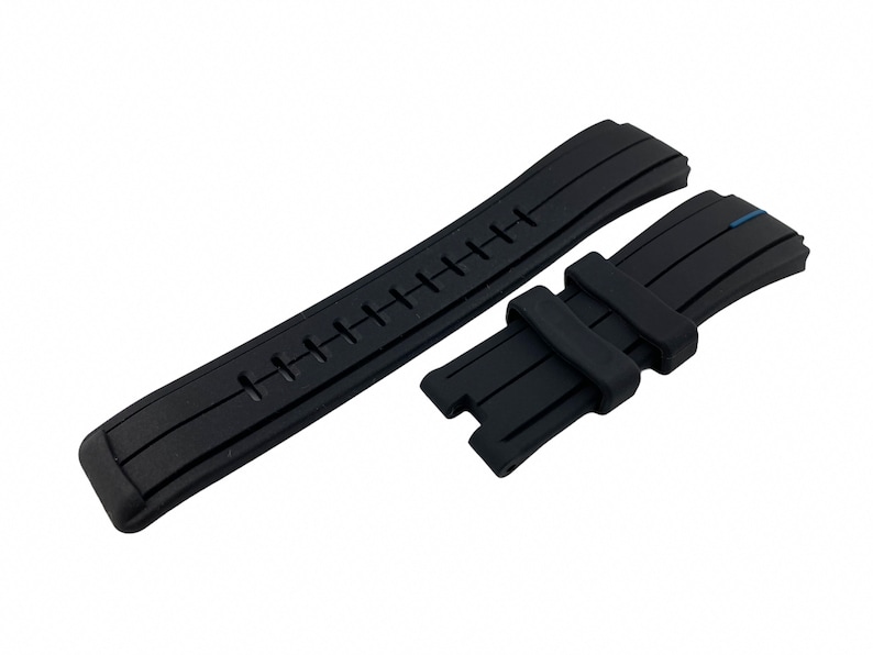 May include: Black rubber watch strap with a textured design and a blue stripe on the underside.