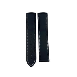 May include: Two black watch straps with white stitching. The straps are made of a rubber-like material and have a pointed end.