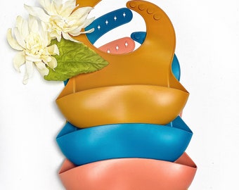 Babero de silicona moderno: recogedor de alimentos para bebés y niños pequeños