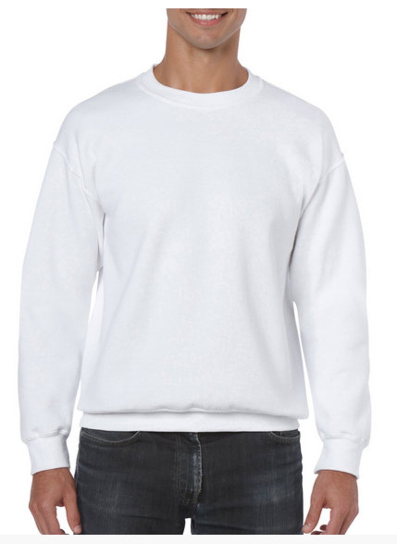 May include: A white crew neck sweatshirt with long sleeves.