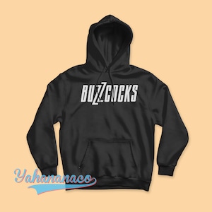 May include: Black hooded sweatshirt with the text "BUZZCOCKS" in white letters on the front.