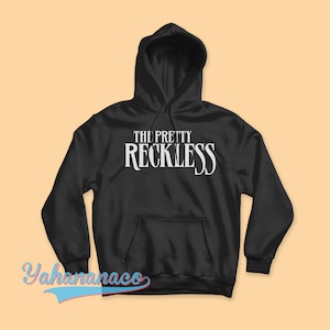 May include: Black hooded sweatshirt with the white text "THE PRETTY RECKLESS" on the front.