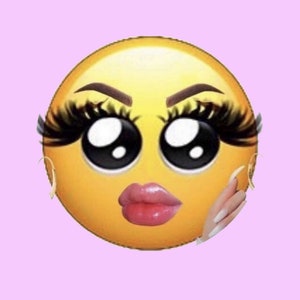May include: A yellow emoji with large eyes, long eyelashes, and a pink pouty mouth. The emoji has a light pink background.