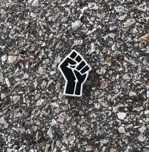 black power croc charms