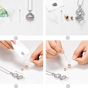 May include: A silver-colored memorial necklace with a lotus flower pendant, shown with a small funnel, pin, and a small amount of ash. The necklace is displayed in several steps, demonstrating how to fill the pendant with ashes.