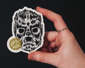 Glow in the Dark Wolfman Halloween Mask Sticker - Durable Vinyl sticker that glows in the dark, weatherproof, 3 x 2.5 in
