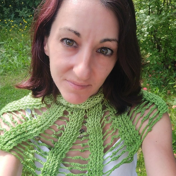 Small green shoulder warmer made with knitting