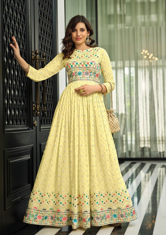 Delightful Yellow Colored Partywear Embroidered Silk Gown – fashionnaari