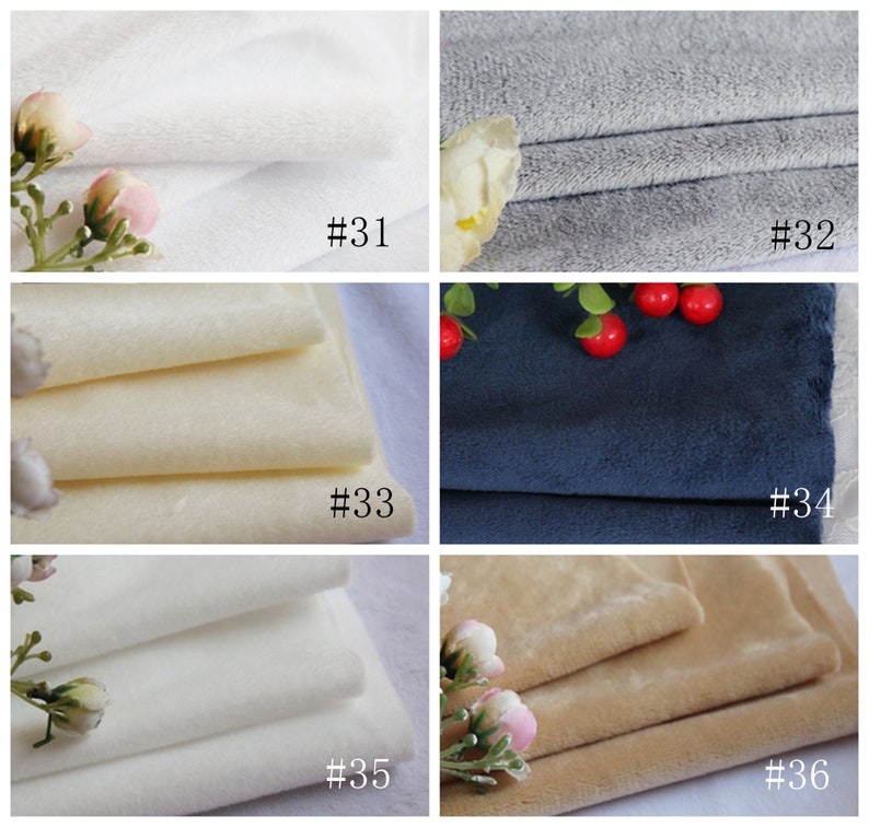 May include: Six fabric swatches in different colors, including white, gray, beige, and blue. The swatches are labeled with numbers 31 through 36.