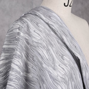 Silver-Grey Fringed Jacquard Embossed Polyester Fabric: Couture Garments