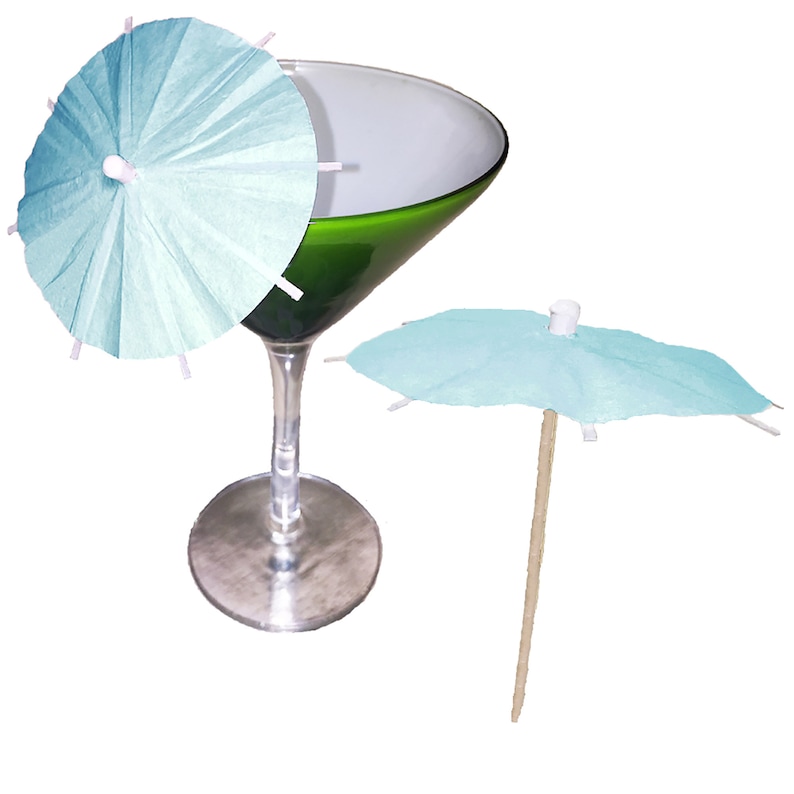 May include: Two light blue paper cocktail umbrellas. One umbrella is on a green martini glass, the other is on a wooden stick.