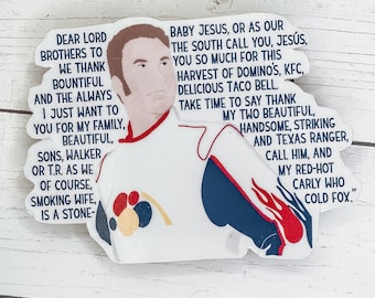May include: A white sticker with a cartoon image of a man with a red, white, and blue hockey jersey. The sticker has text that reads "Dear Lord Brothers to We Thank Bountiful And The Always I Just Want To You For My Family, Beautiful, Sons, Walker Or T.R. As We Of Course, Smoking Wife, Is A Stone- Baby Jesus, Or As Our The South Call You, Jesús, You So Much For This Harvest Of Domino's, KFC, Delicious Taco Bell. Take Time To Say Thank My Two Beautiful, Handsome, Striking And Texas Ranger, Call Him, And My Red-Hot Carly Who Cold Fox."
