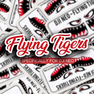 Op de afbeelding: Een verzameling witte stickers met een gestileerd tijgermondontwerp met rode en zwarte accenten. De stickers hebben de tekst "Flying Tigers" in rood script en "Specifically for DJI NEO".