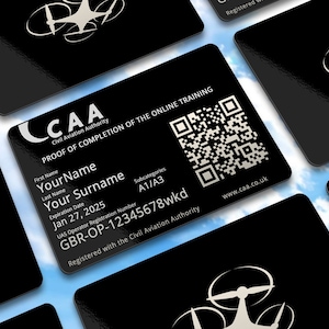 May include: Black and white card with the text "CAA Civil Aviation Authority" and "PROOF OF COMPLETION OF THE ONLINE TRAINING". The card also includes a QR code, a drone icon, and the text "www.caa.co.uk".