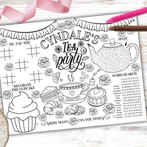 May include: A black and white printable activity sheet with a tea party theme. The sheet includes a tic-tac-toe game, a maze, a word search, and a cupcake to decorate. The text on the sheet says "Cyndale's Tea Party".