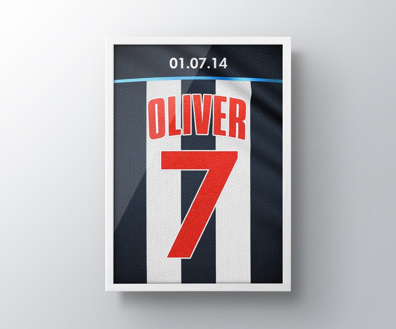 May include: A framed image of a white and black striped jersey with the number 7 and the name "Oliver" printed in red. The date "01.07.14" is printed at the top of the jersey.