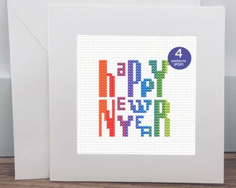 Padrão de ponto cruz feliz ano novo, 4 designs para cartões de felicitações de ano novo