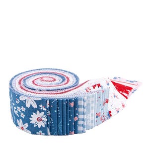 May include: Rolled fabric strips in red, white, and blue. The fabric features floral, star, and flag patterns. The roll is unraveled at the end, showing the different patterns. Ideal for quilting and crafting projects.