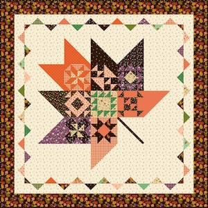 May include: A handmade quilt featuring a large, stylized leaf design in shades of orange, brown, purple, and green. The leaf is composed of various patchwork patterns, set against a cream background with a dotted pattern. The quilt has a brown border with autumn leaf motifs.