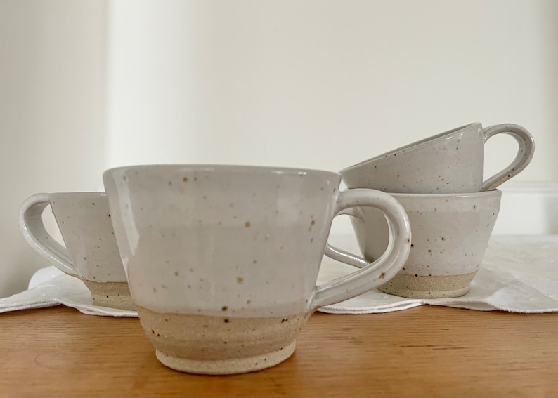 Ceramic stoneware cups with satin white glaze and flecked clay