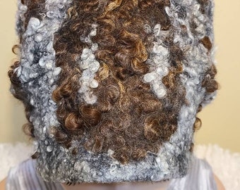 Winter hat from Merino wool  and  lamb locks.