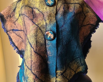 Felted  summer  morning delicate openwork poncho. Felted  from  merino  wool  and decorated  with  viscose