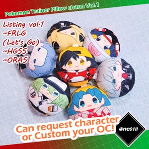May include: A collection of seven round, plush pillow charms featuring stylized anime-style character faces. The text reads: Pokemon Trainer Pillow charm Vol.1, Listing vol.1, FRLG, Let's Go, HGSS, ORAS, Can request character or Custom your OC!, @ne01ll.