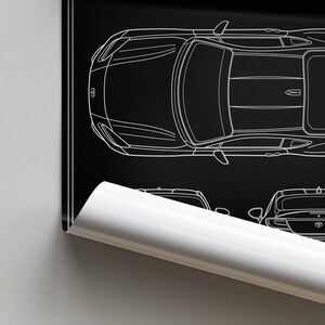 K&ouml;nnte beinhalten: Eine wei&szlig;e Linienzeichnung eines Toyota Supra auf schwarzem Hintergrund. Das Auto wird von oben und von hinten gezeigt.