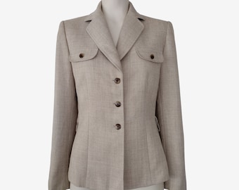 May include: A beige blazer with a notched collar, four button closure, and two flap pockets.