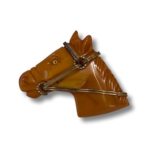 Art Deco Butterscotch Carved Bakelite Horse Brooch
