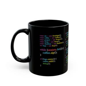 May include: A black ceramic mug featuring colorful programming code text printed on the side. The code includes lines like const me = new Developer, while (anxiety.hit()) { coffee.sip(); }, and if (bugs.exists()) { coffee.refill(); debug(); }.