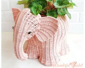Pink wicker elephant basket for nursery decor, woven elephant basket for storage in kids room