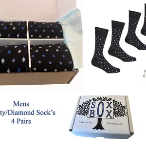 May include: A gift box with four pairs of black patterned socks, featuring blue and white spots and diamonds. The socks are size 6-11. The box is labelled "Sox in a box" and "Shoenique.co.uk".