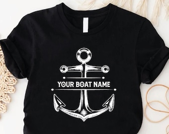 May include: Black t-shirt with a white anchor graphic and the text "YOUR BOAT NAME" printed on it.