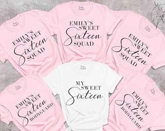 May include: Five pink t-shirts with black text that says "Emily's Sweet Sixteen" and different roles like "Squad" and "Bodyguard". One white t-shirt with black text that says "My Sweet Sixteen".
