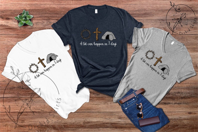K&ouml;nnte beinhalten: Drei T-Shirts mit einem christlichen Ostern-Motiv. Die Shirts zeigen eine Dornenkrone, ein Kreuz und ein Grab mit dem Text "In 3 Tagen kann viel passieren".