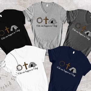 K&ouml;nnte beinhalten: F&uuml;nf verschiedene V-Ausschnitt-T-Shirts in verschiedenen Farben mit einem grafischen Design einer Dornenkrone, einem Kreuz und einem Grab. Der Text auf den Shirts lautet "A lot can happen in 3 days".