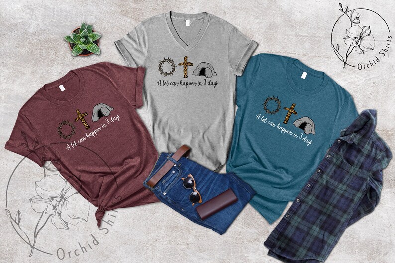 K&ouml;nnte beinhalten: Drei T-Shirts mit einem grafischen Design einer Dornenkrone, einem Kreuz und einem Grab. Der Text auf den T-Shirts lautet "A lot can happen in 3 days".