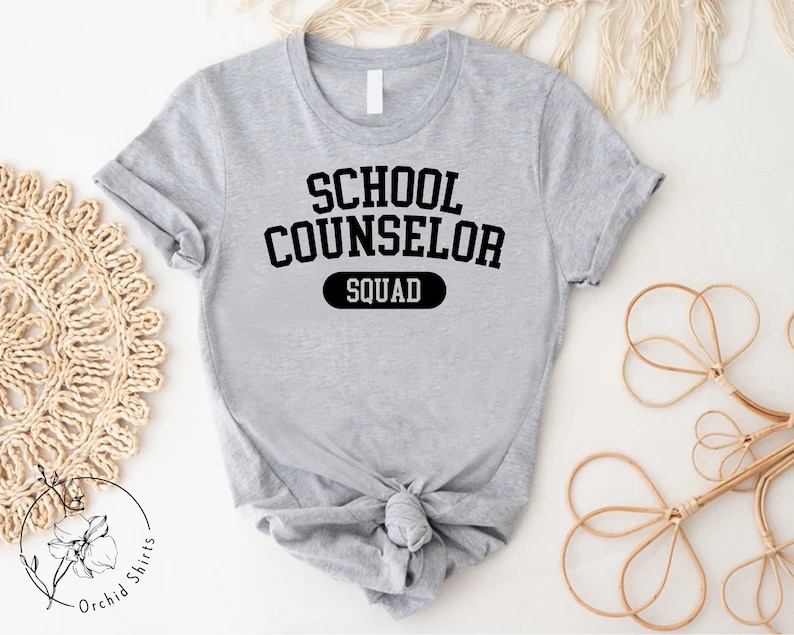 a t - shirt that says school counselor squad