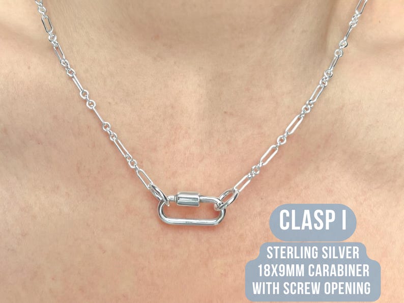 May include: A silver necklace with a carabiner clasp. The clasp is 18x9mm and has a screw opening. The necklace is made of sterling silver. The text "CLASP I" is visible in the image.