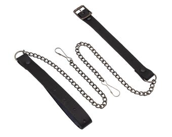 May include: Two black leather straps with metal buckles and a silver chain. One strap has a ring at the end and the other has a buckle.