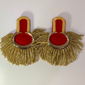 Marching Band Moon Shoulder Epaulette Gold Moon Epaulette With Heavy Gold Spiral Fringe On Red Background