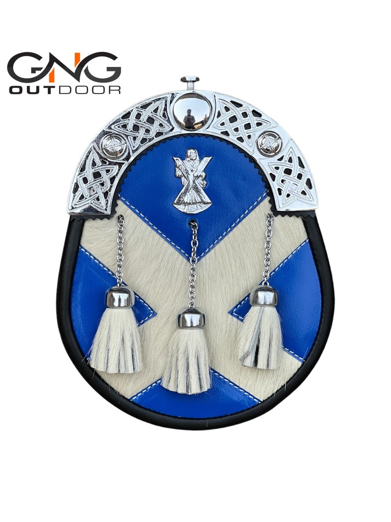 May include: A blue and white leather sporran with a silver chain and three white tassels. The sporran has a silver Celtic knot design and a silver thistle emblem.