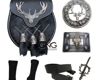 May include: Black kilt outfit with a stag head design. The set includes a sporran, a kilt belt, socks, a kilt pin, and a kilt buckle.