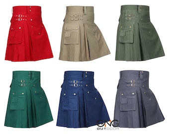 Könnte beinhalten: Sechs verschiedene Utility-Kilts in verschiedenen Farben, darunter Rot, Khaki, Grün, Blau und Grau. Jeder Kilt hat eine Cargo-Tasche, mehrere Schnallen und ein plissiertes Design.