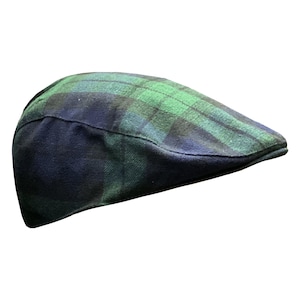 May include: A green and blue checked flat cap.