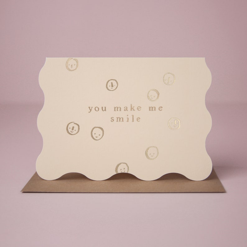 A thank you card or love card featuring luxe stamped gold foil details from the Cosmique range of greeting cards from Sister Paper Co.