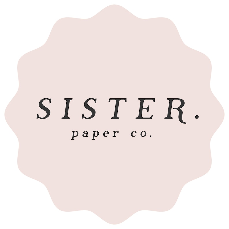 a logo for a company called "Sister Paper Co."