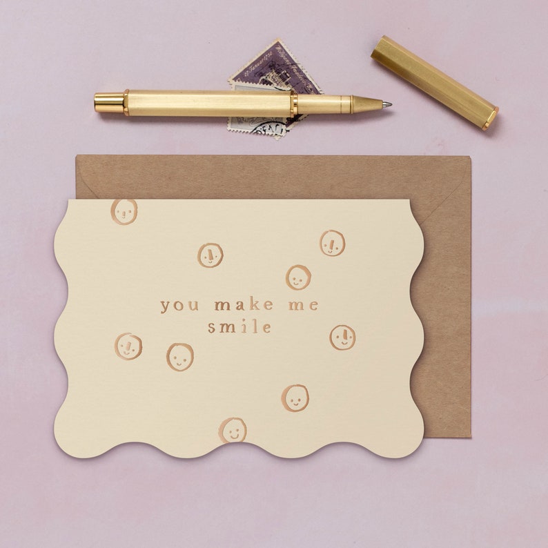 A thank you card or love card featuring luxe stamped gold foil details from the Cosmique range of greeting cards from Sister Paper Co.